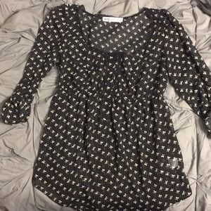 Black top with white bow print